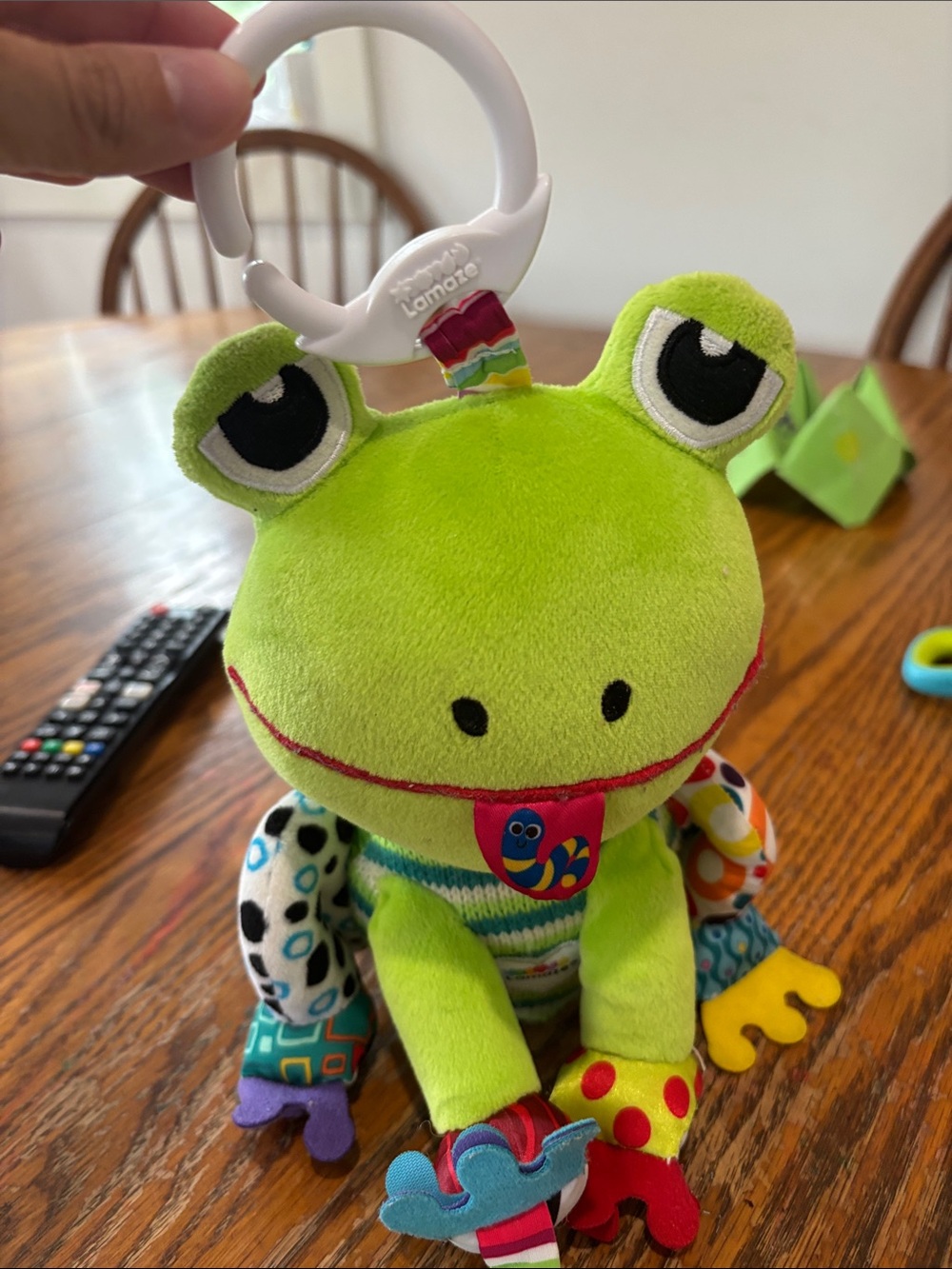 Lamaze Green Plush Frog Activity Toy clips onto anything
